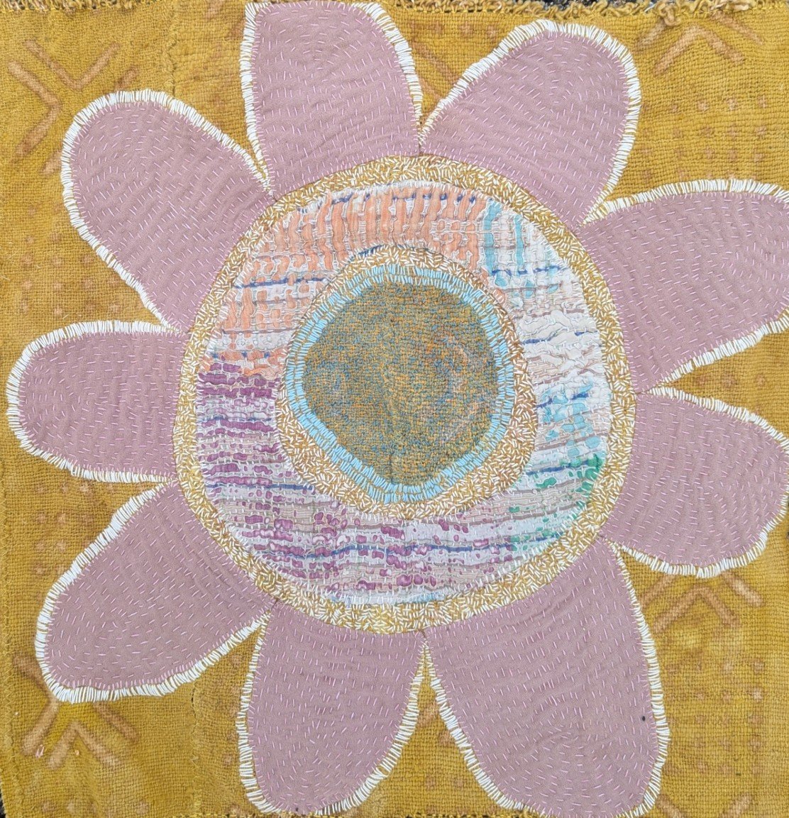 Healing Flower: slow stitch on recycled linen and yellow mud cloth